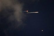 Israeli Airstrikes Hit Central Iran: Deaths Reported in Qom, Explosions in Isfahan