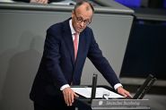 Merz «prudemment optimiste» sur la possibilité d'un accord commercial UE-USA