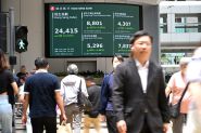 Marchés en Asie: prudence face aux tensions commerciales, le bitcoin à un nouveau record