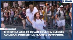 Les journalistes de l'AFP Christina Assi et Dylan Collins, blessés au Liban, portent la flamme olympique